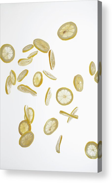 White Background Acrylic Print featuring the photograph Lemon Slices Against A White Background by Dual Dual
