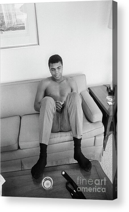 Following Acrylic Print featuring the photograph Muhammad Ali Seated On Couch by Bettmann