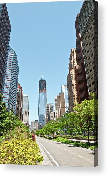 Lower Manhattan Acrylic Print featuring the photograph New Skyline Of Lower Manhattan With by Travelif