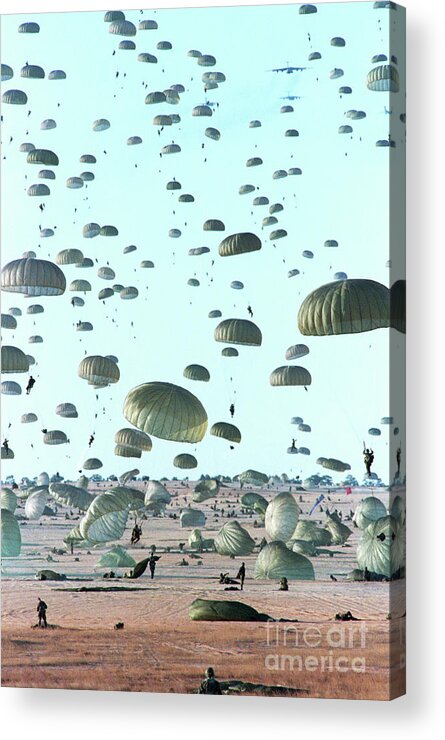 Parachuting Acrylic Print featuring the photograph Paratroopers Line The Sky by Bettmann