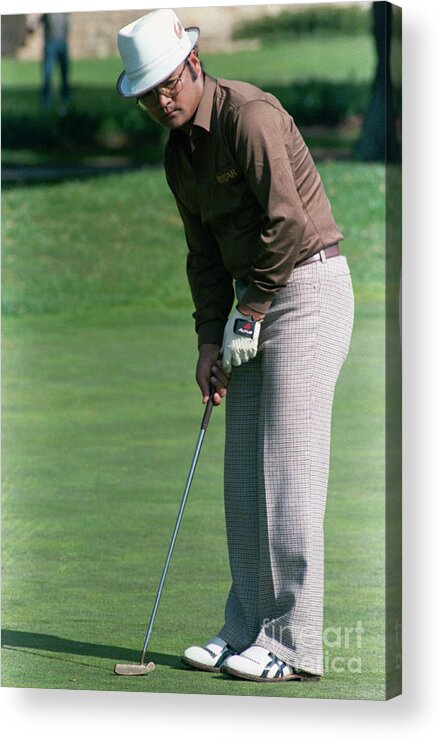 1980-1989 Acrylic Print featuring the photograph Professional Golfer Kikuo Arai Holding by Bettmann