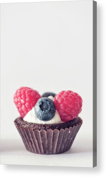 Unhealthy Eating Acrylic Print featuring the photograph Raspberries And Blueberries Cupcake by Marta Nardini
