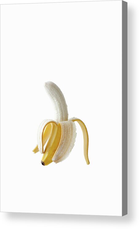 White Background Acrylic Print featuring the photograph Skin Of Banana Peeled Off Half by Michael H