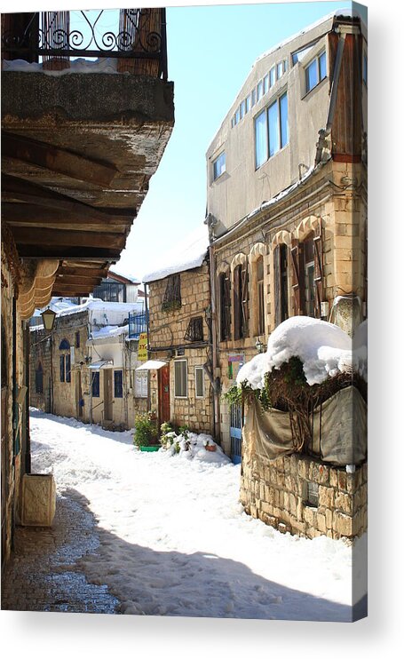  Acrylic Print featuring the photograph The Old City of Safed in the Galilee in the snow by Alon Mandel