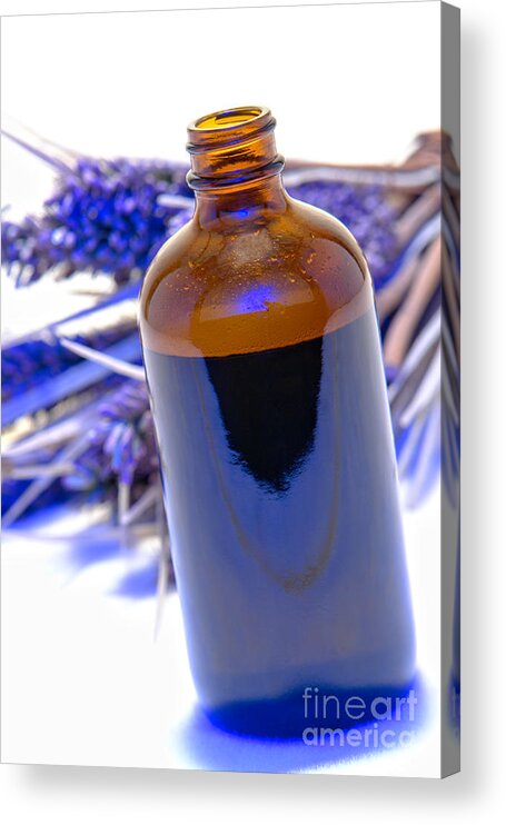 Aromatherapy Acrylic Print featuring the photograph Aromatherapy Bottle with Blue Flower Background by Olivier Le Queinec