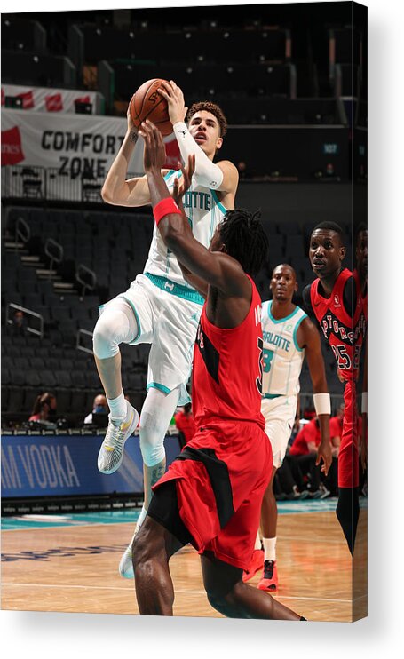 Nba Pro Basketball Acrylic Print featuring the photograph Toronto Raptors v Charlotte Hornets by Kent Smith