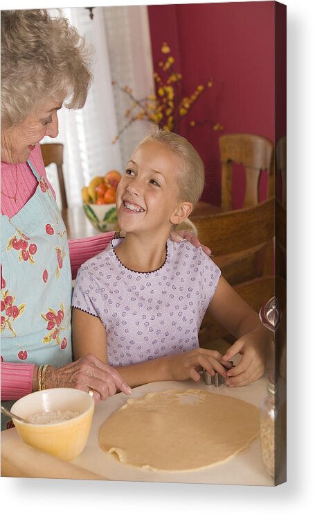4-5 Years Acrylic Print featuring the photograph Grandmother and granddaughter baking #3 by Comstock Images