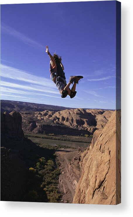 Diving Into Water Acrylic Print featuring the photograph Base jumper in midair by William R. Sallaz
