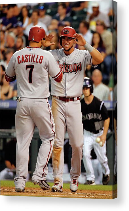 Second Inning Acrylic Print featuring the photograph David Peralta, Welington Castillo, and Kyle Kendrick by Doug Pensinger