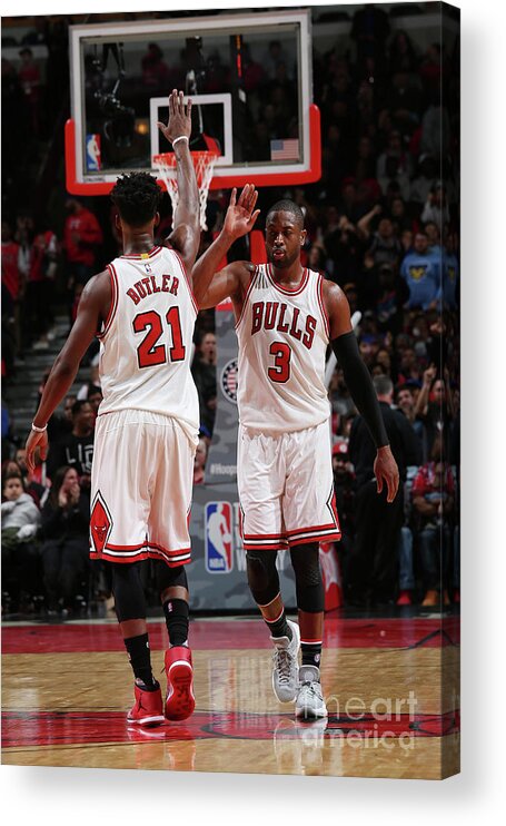 Jimmy Butler Acrylic Print featuring the photograph Jimmy Butler and Dwyane Wade by Gary Dineen