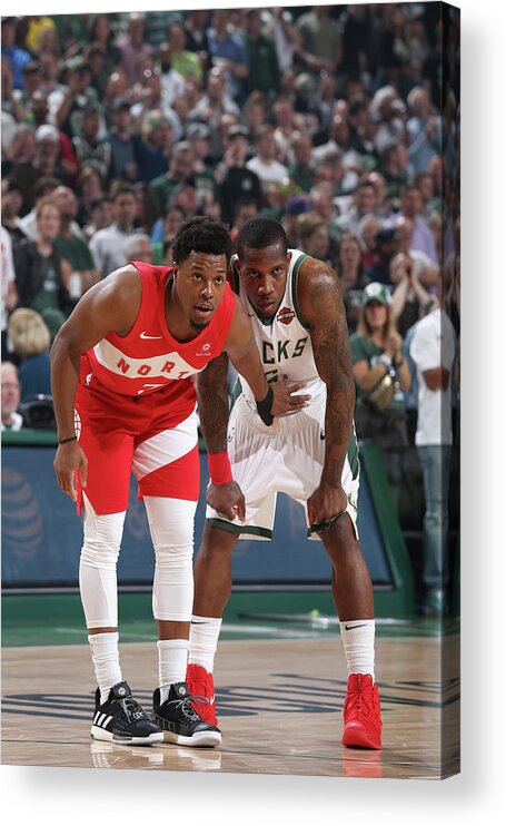 Kyle Lowry Acrylic Print featuring the photograph Kyle Lowry and Eric Bledsoe by Gary Dineen