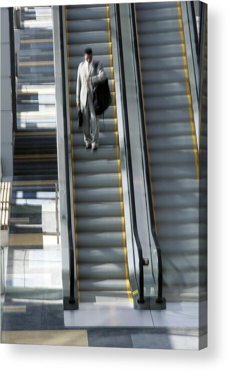 People Acrylic Print featuring the photograph Man on escalator with luggage by Comstock Images