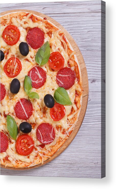 Vertical Acrylic Print featuring the photograph Pizza With Salami, Tomato, Cheese, Olives And Basil Close-up by Alleko