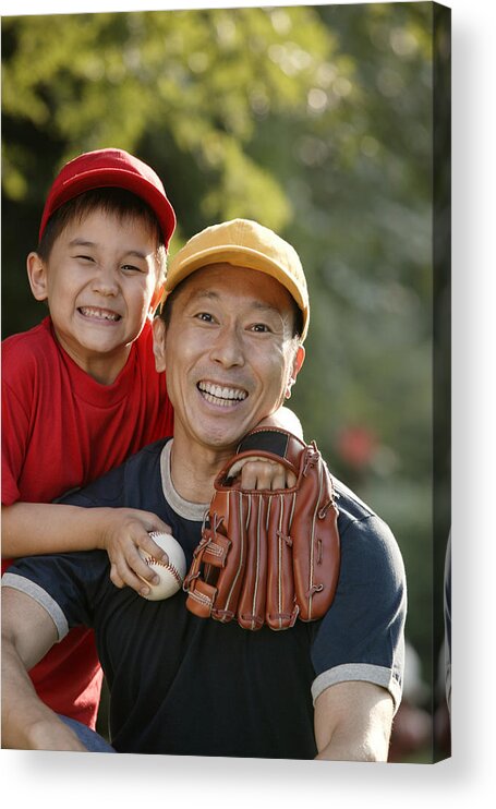 Softball Acrylic Print featuring the photograph Portrait of father and son with baseball and mitt by Comstock