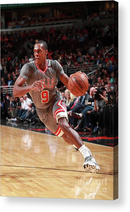 Nba Pro Basketball Acrylic Print featuring the photograph Rajon Rondo by Jeff Haynes