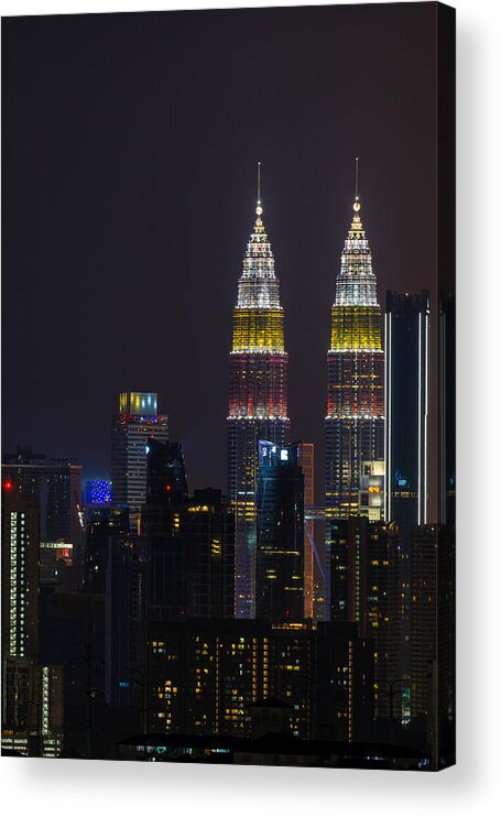 Event Acrylic Print featuring the photograph The Kuala Lumpur skyline glittered with a kaleidoscope of colours and spectacular lights and sound to mark the nation’s 62 years of independence of Malaysia. by Shaifulzamri