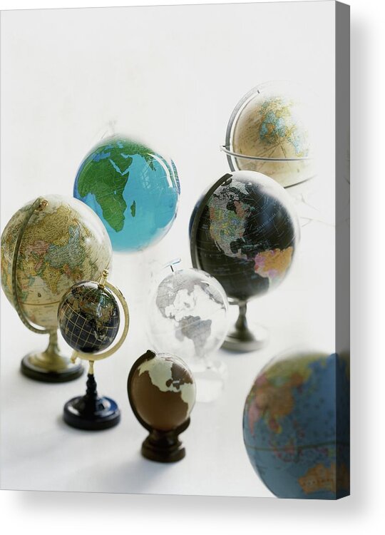 Home Acrylic Print featuring the photograph A Collection Of Globes by Romulo Yanes