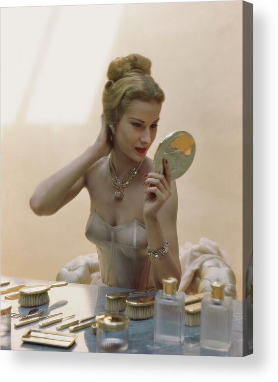 Beauty Acrylic Print featuring the photograph A Model At A Dressing Table by John Rawlings