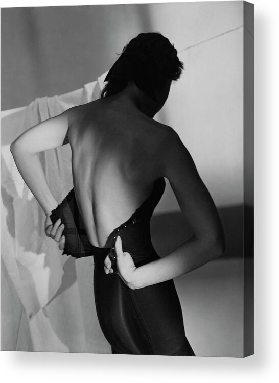 Fashion Acrylic Print featuring the photograph A Model Fastening Her Brassiere by Horst P. Horst