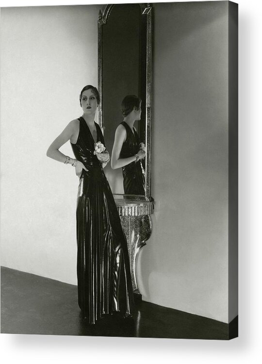 Fashion Acrylic Print featuring the photograph A Model Wearing A Lezard Noir Dress by George Hoyningen-Huene