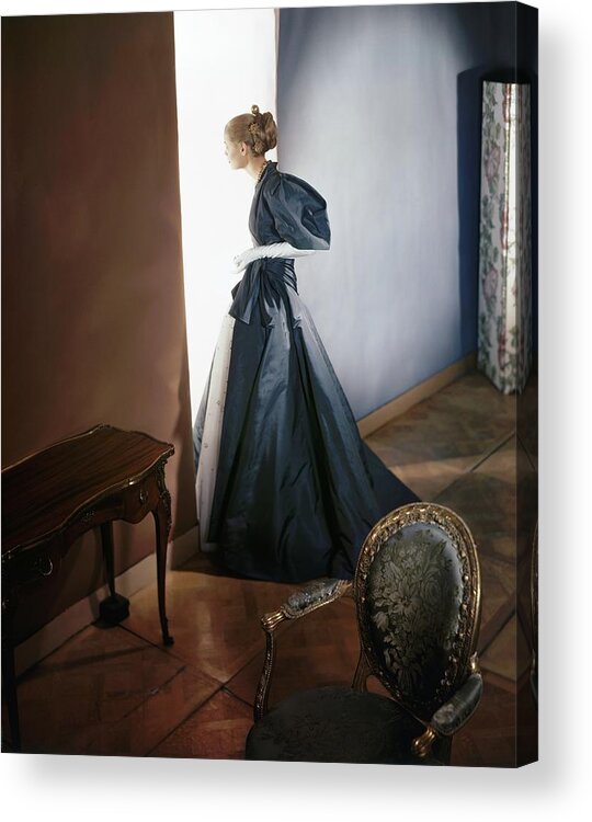 Fashion Acrylic Print featuring the photograph A Model Wearing A Slate Gray Coat by Horst P Horst