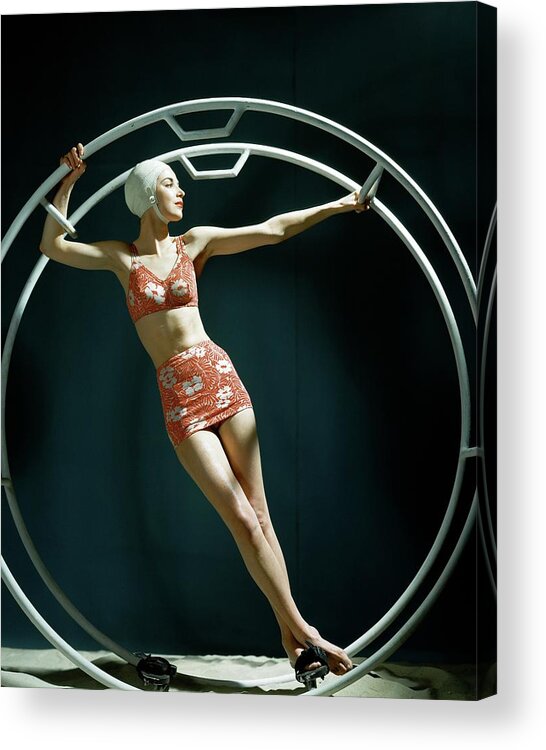 Swimwear Acrylic Print featuring the photograph A Model Wearing A Swimsuit In An Exercise Ring by John Rawlings