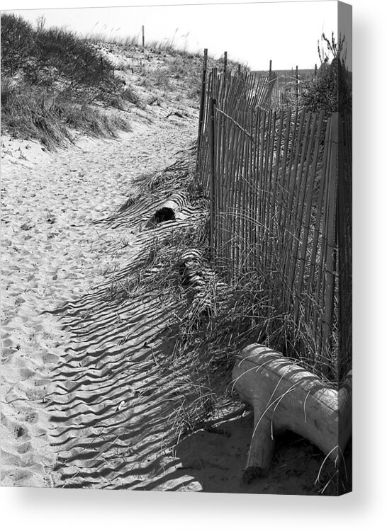 Beach Retaining Fence Acrylic Print featuring the photograph A Stroll In The Sand by Jeff Folger
