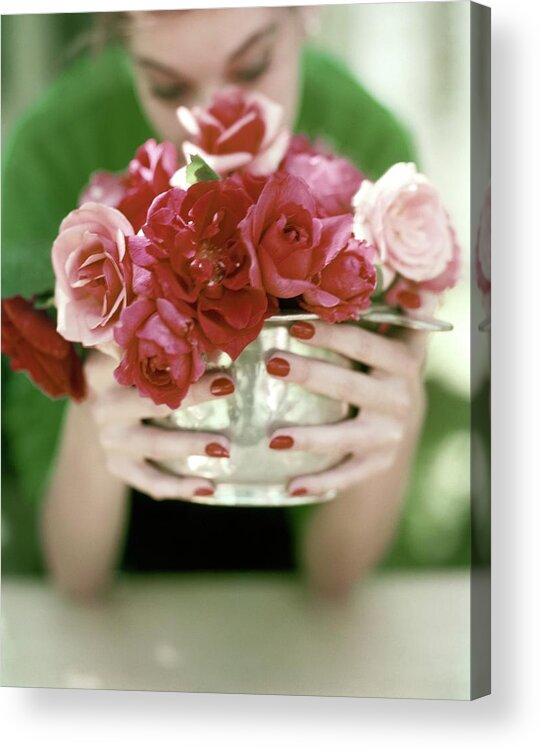 Flowers Acrylic Print featuring the photograph A Woman Holding A Bowl Of Roses by John Rawlings