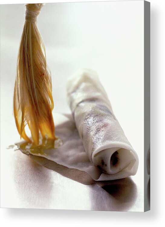 Cooking Acrylic Print featuring the photograph An Egg Roll by Romulo Yanes
