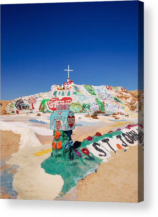 Salvation Mountain Acrylic Print featuring the photograph The colorful mountain by Nastasia Cook