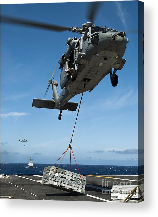 Flight Deck Acrylic Print featuring the photograph An Mh-60s Sea Hawk Helicopter Lowers by Stocktrek Images