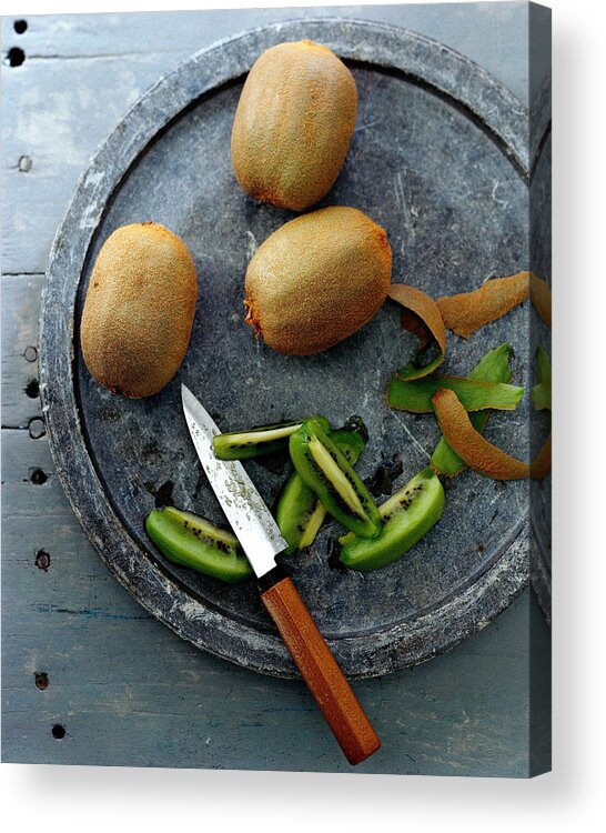 Foodstudio Shotstill Lifeplatetablewareknifekiwi Fruitfruithealthy Eatingsliceview From Above #condenastgourmetphotograph November 1st 2006 Acrylic Print featuring the photograph A Plate Of Kiwifuit by Romulo Yanes