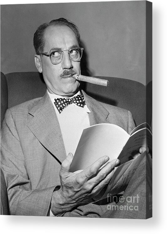 Smoking Acrylic Print featuring the photograph Groucho Marx Seated And Smoking Cigar by Bettmann
