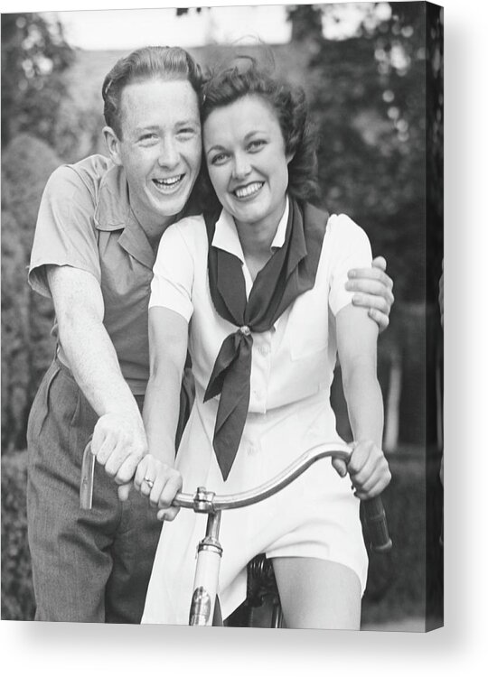 Young Men Acrylic Print featuring the photograph Man Embracing Woman Sitting On Bike by George Marks