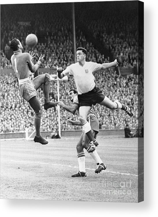 People Acrylic Print featuring the photograph Soccer Players In Action by Bettmann