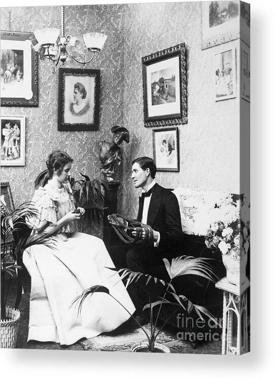 People Acrylic Print featuring the photograph Victorian Couple Alone Knitting by Bettmann