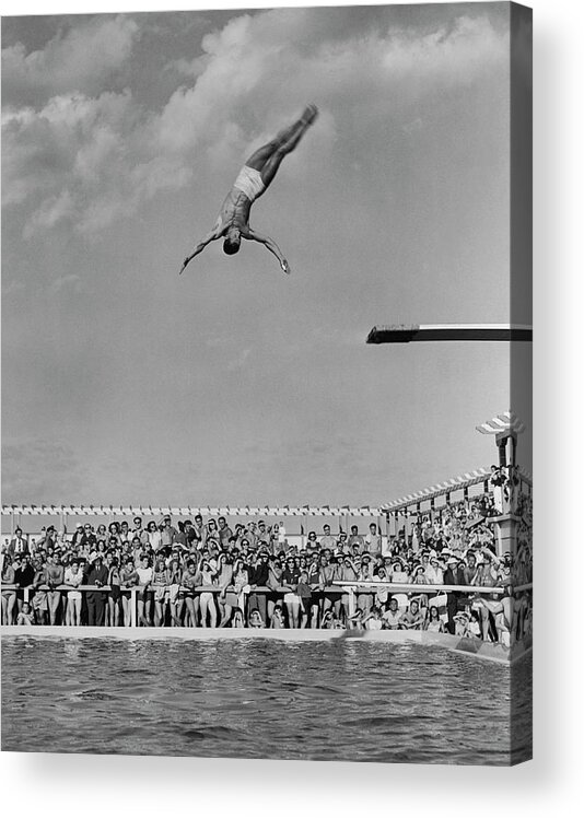 Diving Into Water Acrylic Print featuring the photograph Watching A Dive by Pictorial Parade