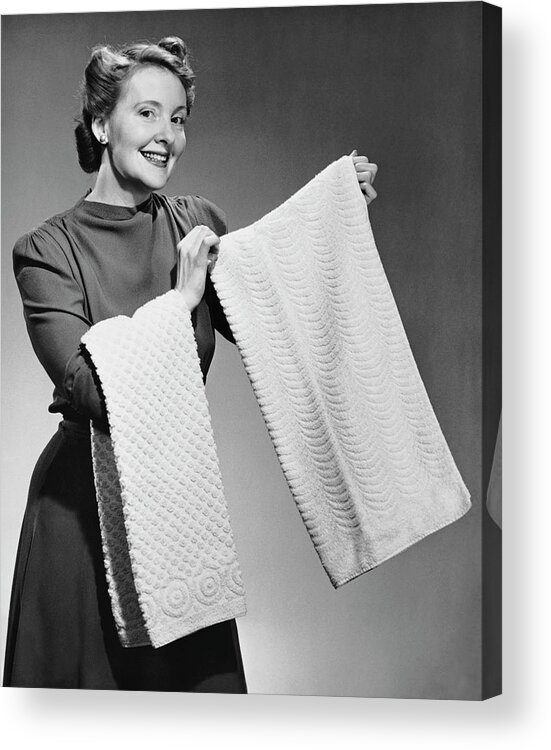 Three Quarter Length Acrylic Print featuring the photograph Woman Holding Up Towels by George Marks