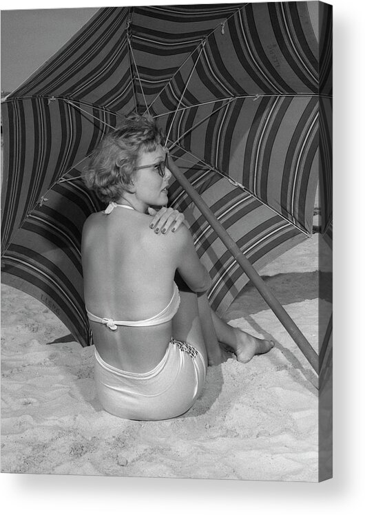 People Acrylic Print featuring the photograph Woman Sitting On Beach Under Umbrella by George Marks