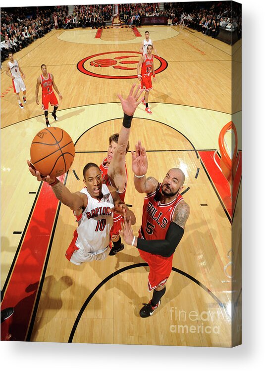 Nba Pro Basketball Acrylic Print featuring the photograph Carlos Boozer and Demar Derozan by Ron Turenne