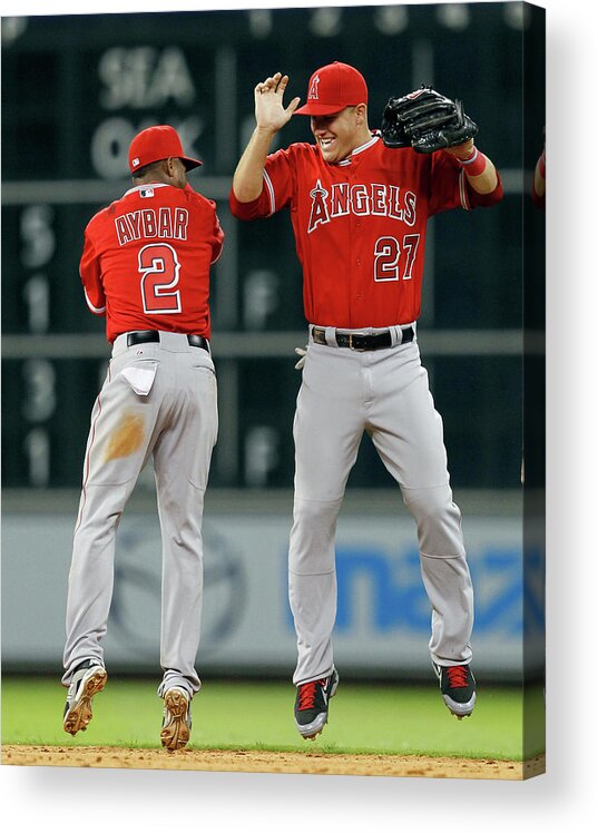 American League Baseball Acrylic Print featuring the photograph Erick Aybar and Mike Trout by Bob Levey