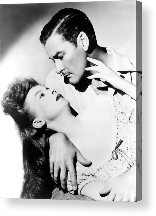 Errol Flynn Acrylic Print featuring the photograph ERROL FLYNN and IDA LUPINO in ESCAPE ME NEVER -1947-, directed by PETER GODFREY. by Album