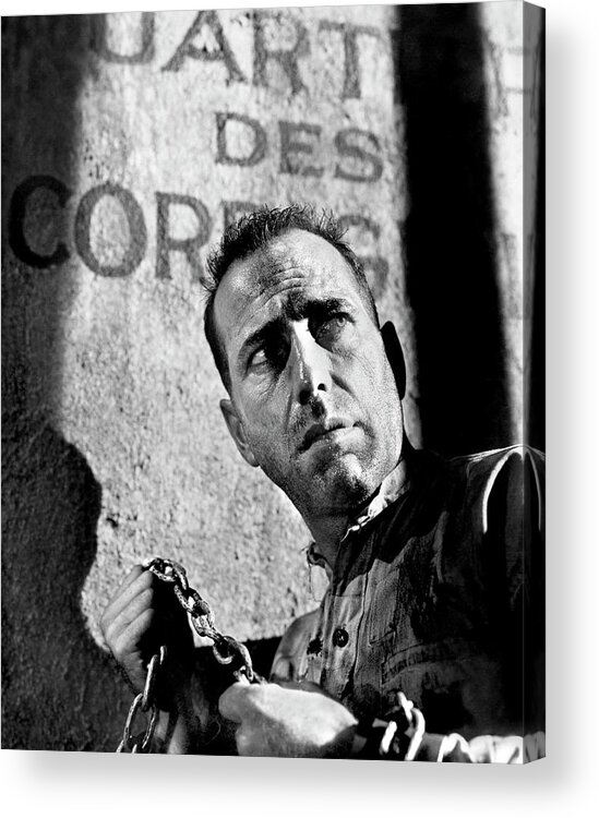 Humphrey Bogart Acrylic Print featuring the photograph HUMPHREY BOGART in PASSAGE TO MARSEILLE -1944-, directed by MICHAEL CURTIZ. by Album