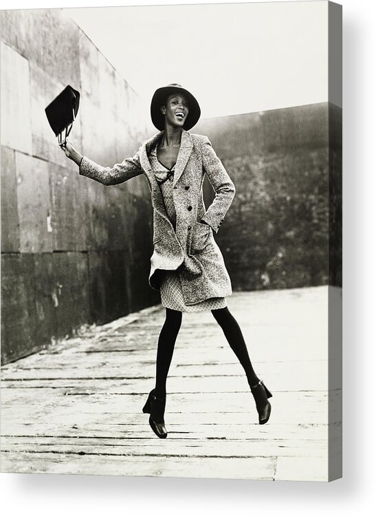 Black And White Acrylic Print featuring the photograph Naomi Campbell Jumping in the Air by Arthur Elgort