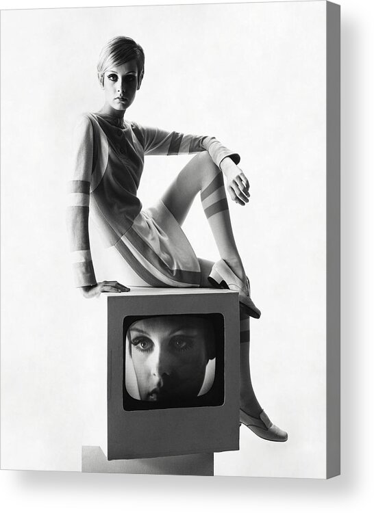 Model Acrylic Print featuring the photograph Twiggy Atop A Television Box by Bert Stern