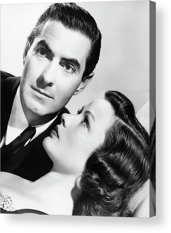 Gene Tierney Acrylic Print featuring the photograph TYRONE POWER and GENE TIERNEY in THE RAZOR'S EDGE -1946-, directed by EDMUND GOULDING. by Album