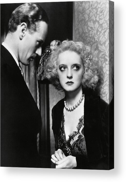 Bette Davis Acrylic Print featuring the photograph LESLIE HOWARD and BETTE DAVIS in OF HUMAN BONDAGE -1934-. by Album
