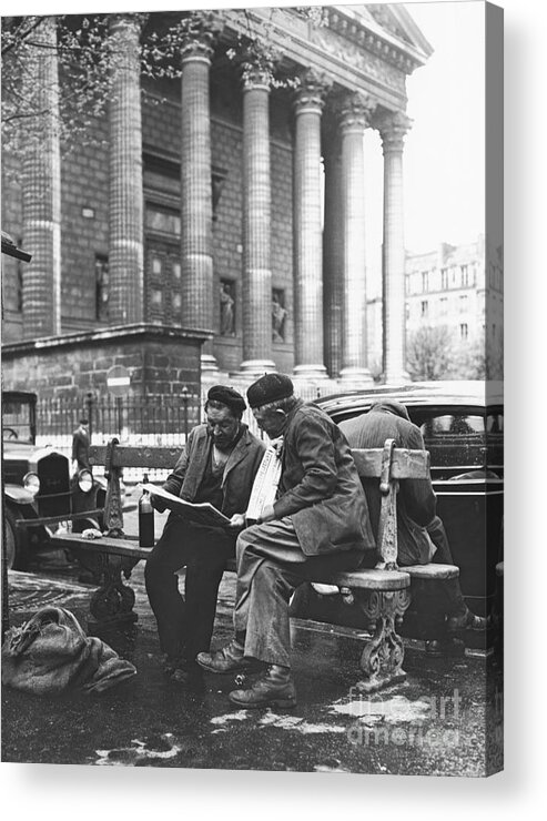 Mature Adult Acrylic Print featuring the photograph Homeless Men Reading Newspaper by Bettmann