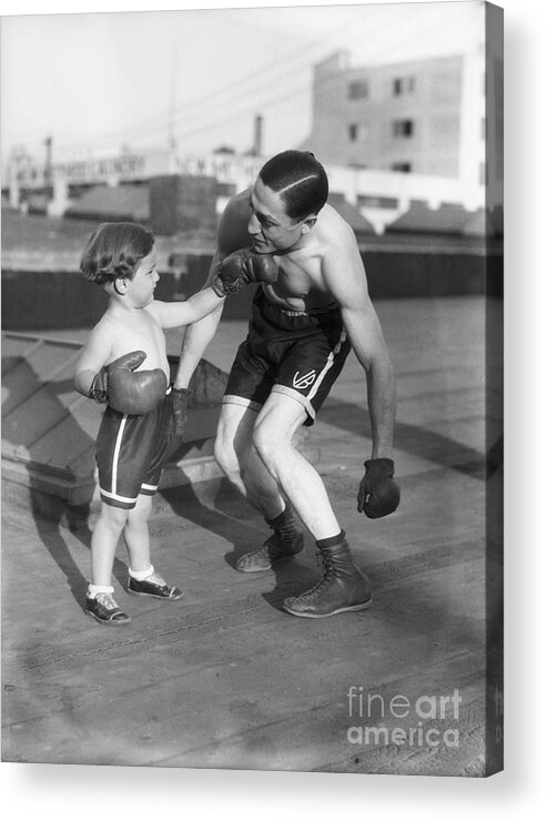 Following Acrylic Print featuring the photograph Son Giving Boxer Father Ko Punch by Bettmann