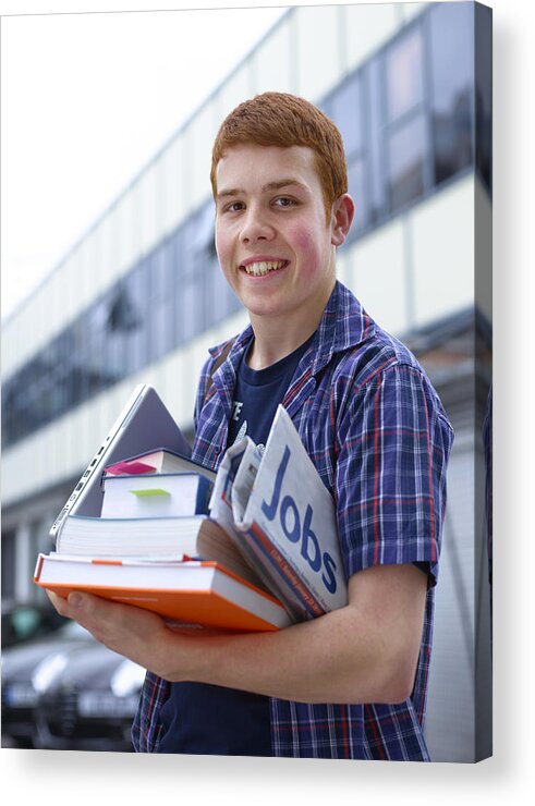 Education Acrylic Print featuring the photograph Teenage university student with jobs news paper by Peter Dazeley